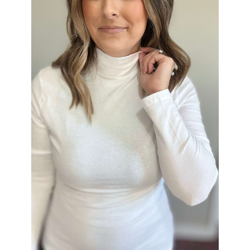 White Long Sleeve Turtleneck:The Rustic Buffalo Boutique